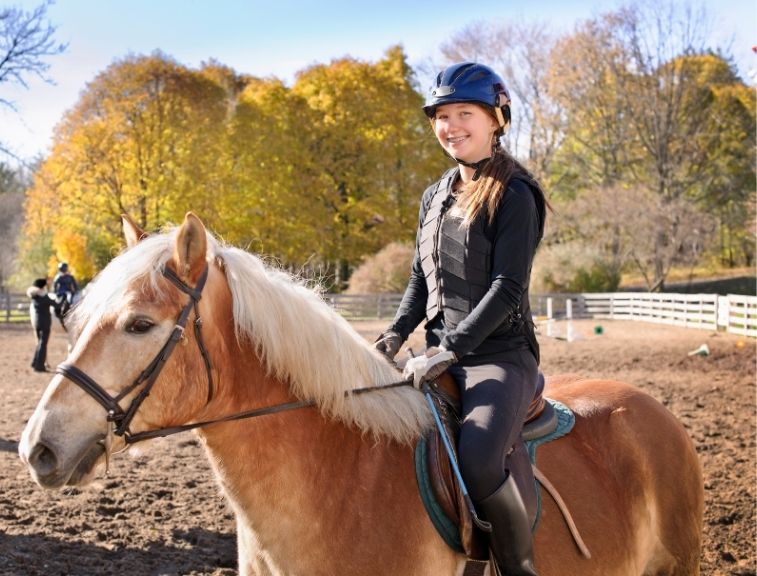 girl riding a horse